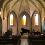 Concert piano setting in Church Of Scotland in Geneva